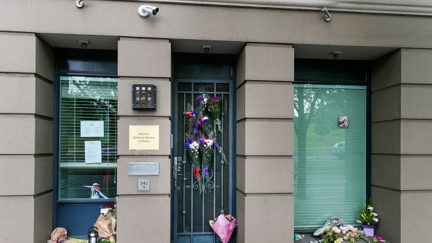 Flowers are laid at the French Consulate in St Kilda Road to honour the victims of the attacks. 