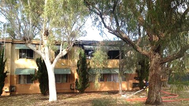 One man has been rushed to hospital suffering from burns and smoke inhalation after the blast in the block of units in Lockridge. Photo: Peter Kapsanis, Channel 9