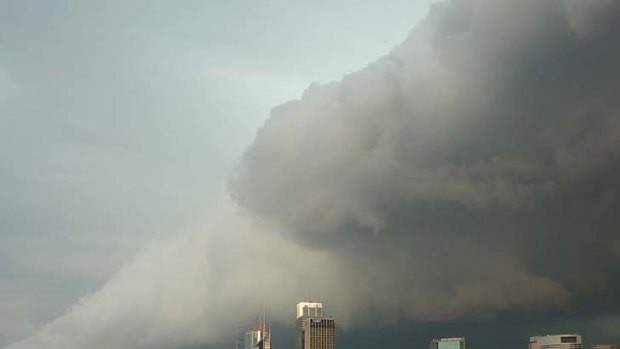 City storm ... dark clouds dominate the city skyline.