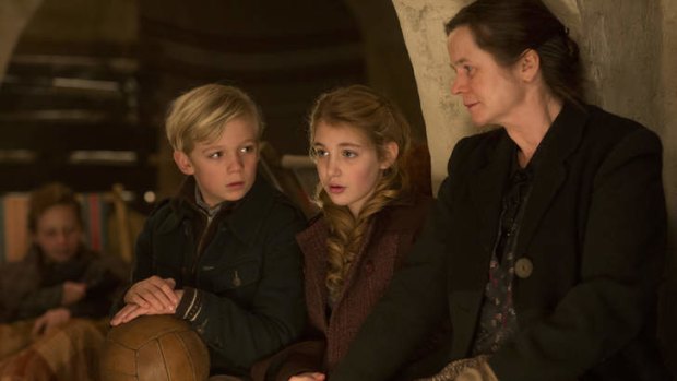 Nico Liersch, Sophie Nelisse and Emily Watson in <i>The Book Thief</i>.