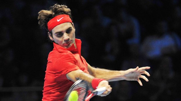 Switzerland's Roger Federer powers a characteristic forehand.