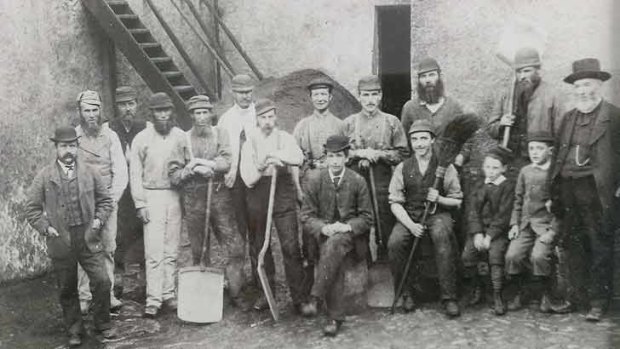 Employees at the Mortlach distillery in Scotland, circa 1870, included young clerk William Grant (far left) and head brewer John McGregor (far right).
