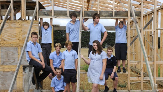 The Mornington Secondary College students with their unfinished building.