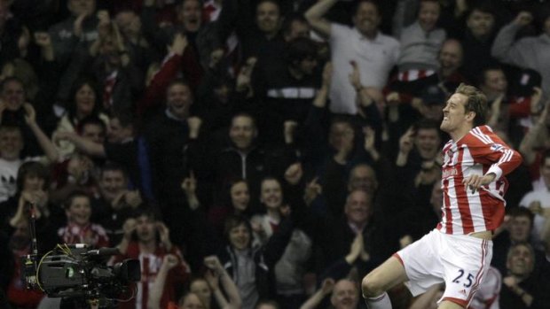 Stoke City's Peter Crouch celebrates his stunning goal against Manchester City.