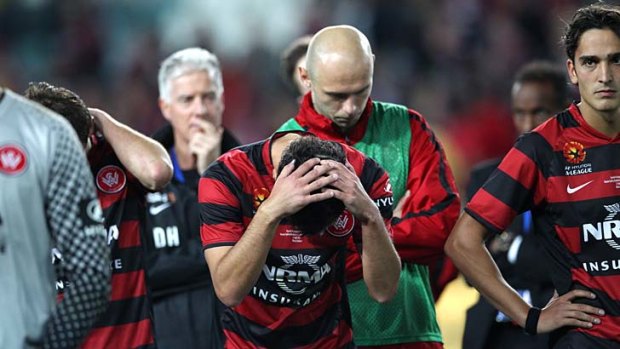 Western Sydney Wanderers players after losing the A-League grand final.