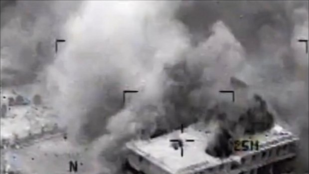 Video released by US Central Command showing a building in Tall Al Qitar, Syria, moments after a US airstrike.