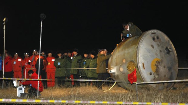 The Shenzhou VIII spacecraft is recovered from China's western desert.