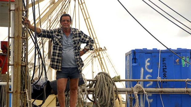 Commercial fisherman Gary Grant, pictured on his boat in Gladstone Marina, fears for the health of Gladstone Harbour.
