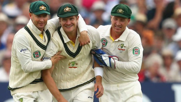 Injury cloud: Shane Watson congratulated by Michael Clarke and Brad Haddin after he took a catch to dismiss Ian Bell.