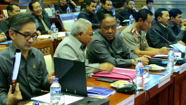 Indonesia Foreign minister Marty Natalegawa; Defence Minister Purnomo Yusgiantoro; and head of state intelligence agency BIN, Marciano Norman wait to answer questions on spying before the Indonesian Parliament.