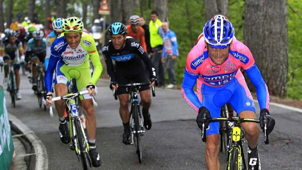 Lampre-ISD's Michele Scarponi (right) of Italy climbs during the 169-kilometre 15th stage of the Giro d'Italia from Busto Arsizio to Pian de Resinelli.