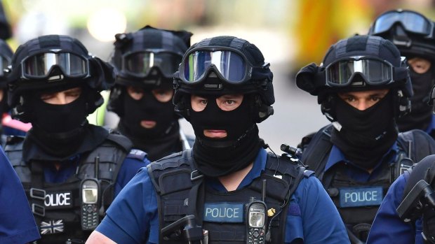 Armed police on St Thomas Street, London.