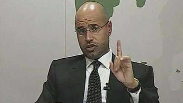 Saif al-Islam, son of Libyan leader Muammar Gaddafi, issues his warning on state television in Tripol.