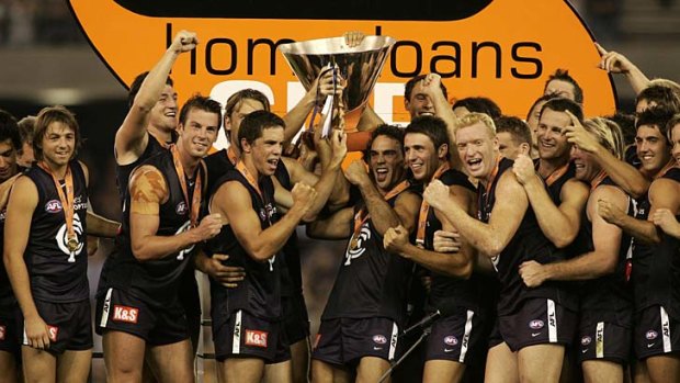 Wizardly display: Carlton's 2005 team celebrates its win in the pre-season competition.