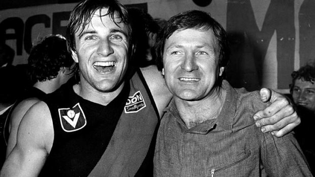 Essendon's Tim Watson and coach Kevin Sheedy after defeating North Melbourne in the 1983 Preliminary Final.