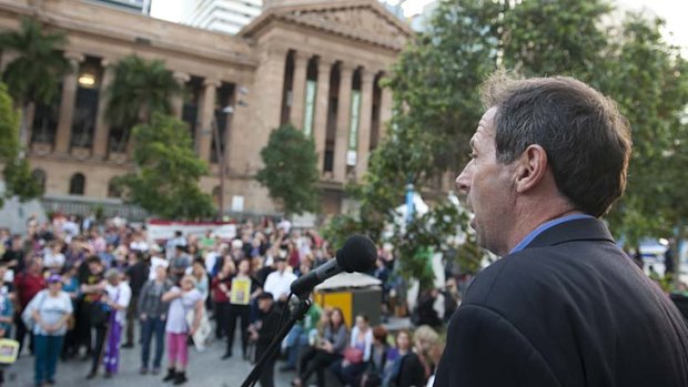 Professor John Quiggin speaks to protesters in Brisbane's CBD.