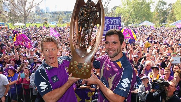Craig Bellamy and Storm captain Cameron Smith during the Melbourne's NRL Grand Final celebrations.
