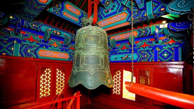 A bell hanging in a temple in Beihai Park, Dongcheng.