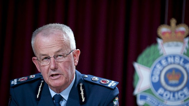Queensland Police Commissioner, Bob Atkinson, announces news of the arrest.