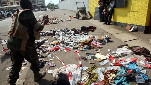 Aftermath ... piles of abandoned shoes and clothing at the scene following the stampede.