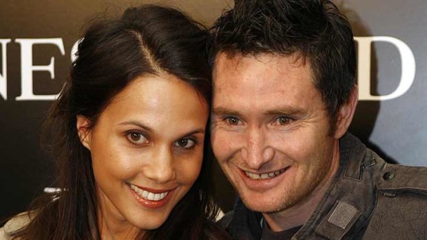 Two kids at home ... Dave Hughes and wife Holly.