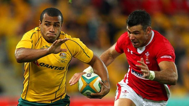'Game changer' &#8230; Will Genia makes a break during the Test with Wales in June.