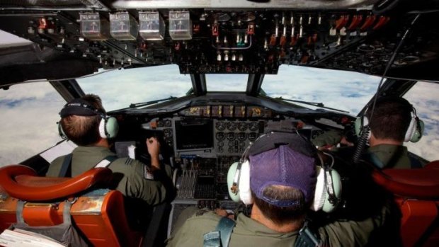 RAAF crew aboard an AP-3C Orion on a search mission over the southern Indian Ocean.