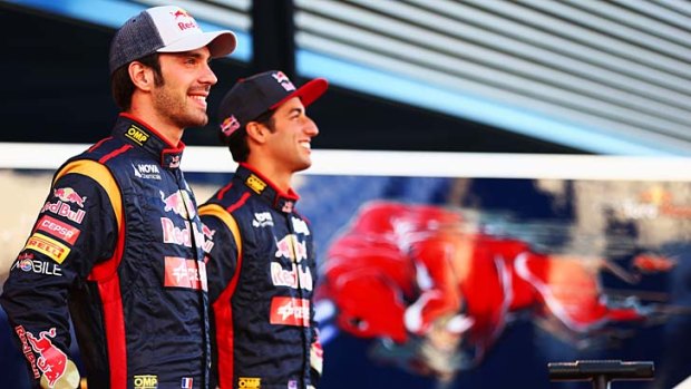 Toro Rosso twins: Jean-Eric Vergne of France and and Daniel Ricciardo of Australia pose during the recent Toro Rosso F1 STR8 launch at Jerez circuit in Spain.