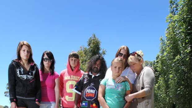 Jodie Brunton (second right) at the scene of her daughter Kyralee's death, along with Kyralee's grandmother, Diane Brunton, (far right), her aunt Jessica Kidd (far left) and other family members.