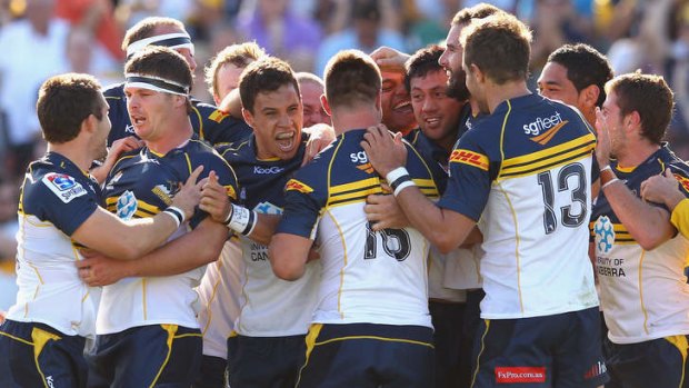 The Brumbies celebrate their last-minute home win over the Cheetahs in May 2012.