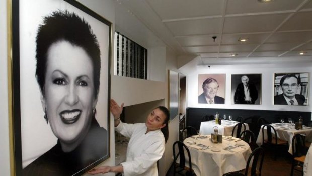 Caterina Tarchi with the portrait of Clover Moore at Machiavelli Restaurant