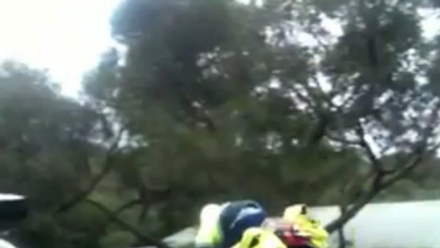 The postie is filmed landing badly after taking the home-made jump at speed in Anglesea.