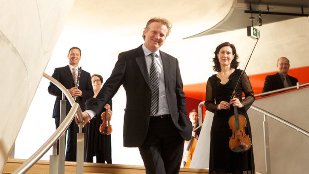 Australian World Orchestra conductor Alexander Briger (front centre) with, from left, musicians Frank Celata, Amy Brookman, Matt Hoy, Anna McMichael and Simon Oswell.