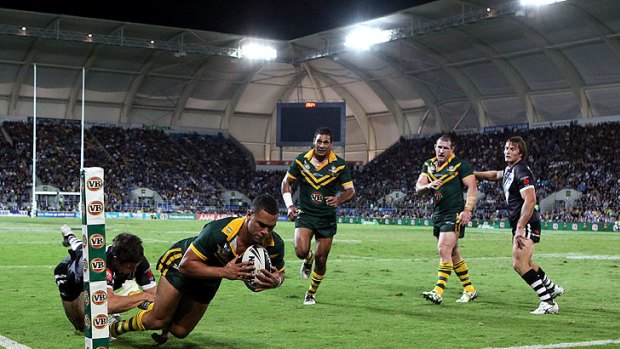 Australia’s Jharal Yow Yeh crosses the line against the Kiwis at Skilled Park on the Gold Coast.