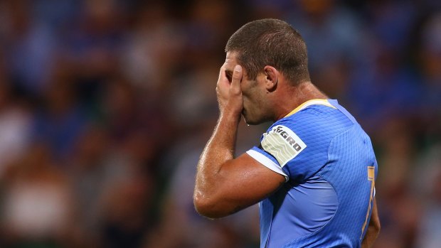 Tough loss: Matt Hodgson of the Force can't look during the  match against the Waratahs.