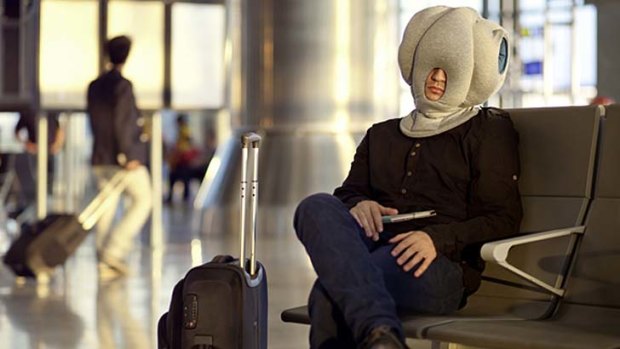 The 'Ostrich Pillow' is a new portable device that its inventors say will "enable power naps anytime, anywhere," including in airport lounges and on planes.