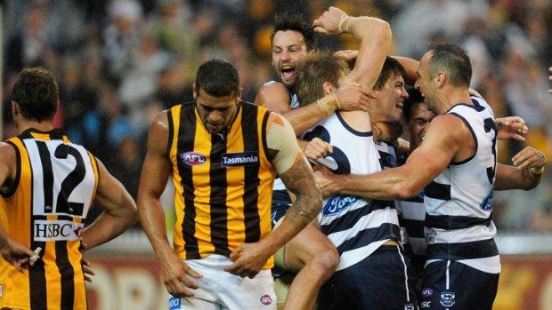 Geelong players celebrate after edging out Hawthorn in another classic earlier this year.