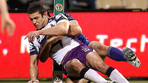 Matt Duffie scores a try during a match between Melbourne Storm and the Canterbury Bulldogs earlier this year.