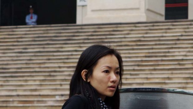 Support ... Ng's wife, Niki Chow, at the court.