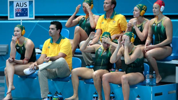 So close ... the Australian bench watch their team go down to the US.