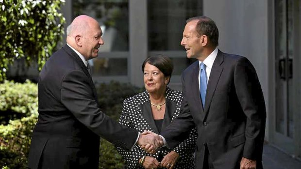 General Peter Cosgrove with Prime Minister Tony Abbott and his wife Lynne.