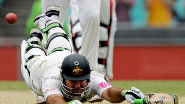 File photo: Australian batsman Ricky Ponting dives to make his ground and reach his 100 on day two of the second cricket Test against India at the Sydney Cricket Ground.