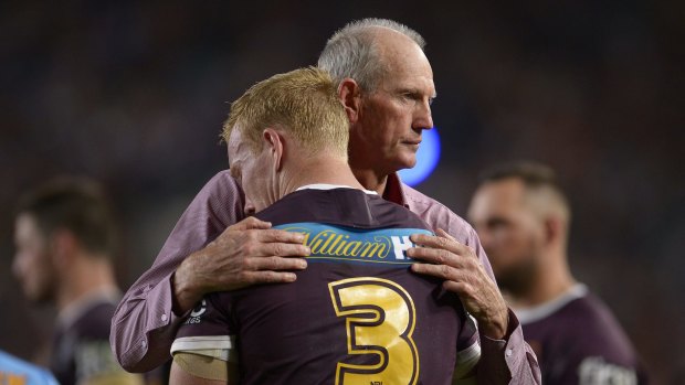 Gut wrenching: Wayne Bennett consoles Jack Reed after the grand final loss to the Cowboys.