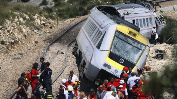Rescue teams and passengers at the site where a train derailed near village of Rudine, southern Croatia.
