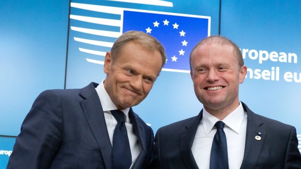 European Council President Donald Tusk, left, with Maltese Prime Minister Joseph Muscat at an EU summit in Brussels in June.