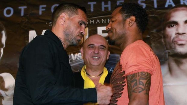 Ready to rumble: Anthony Mundine and Shane Mosley square up to each other on Wednesday.