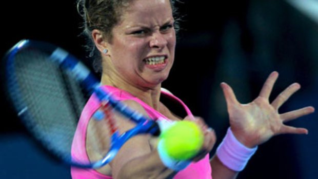 Heavy hitter ... Kim Clijsters hammers a forehand during her Sydney International win over Victoria Azarenka last night.
