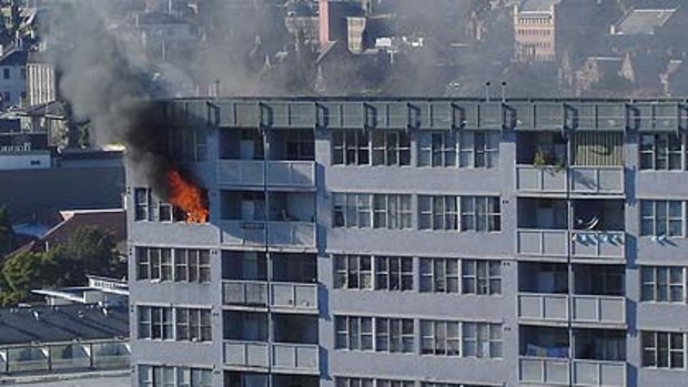 The fire under way today in the block at Pyrmont Bridge Road.