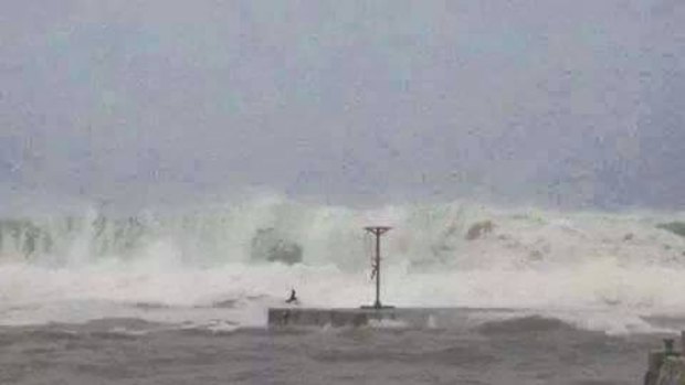 A storm surge created by Cyclone Pam crashes into the coastline of Tuvalu.