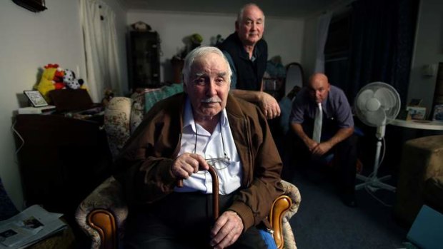 Clive Palmer's half-brother George, with his sons Christopher (left) and David, in his Corio home.